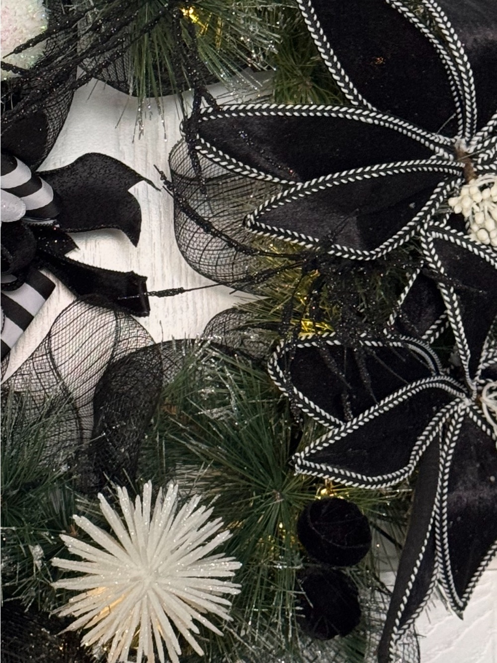 Black and White Decorative Floral Accent Wreath with Musical Notes and Lights